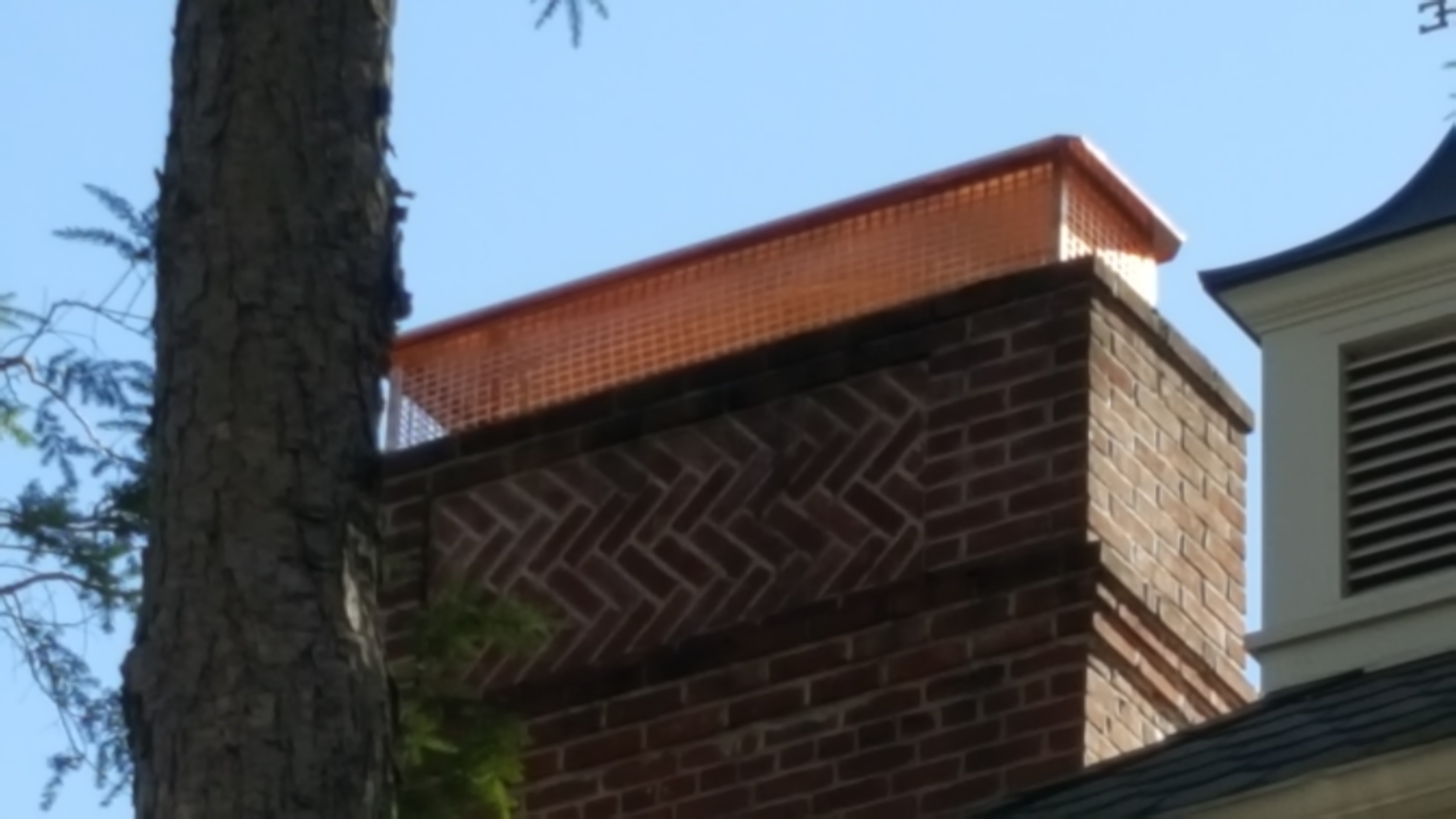 New stainless steel chimney cap installed in Dix Hills, NY