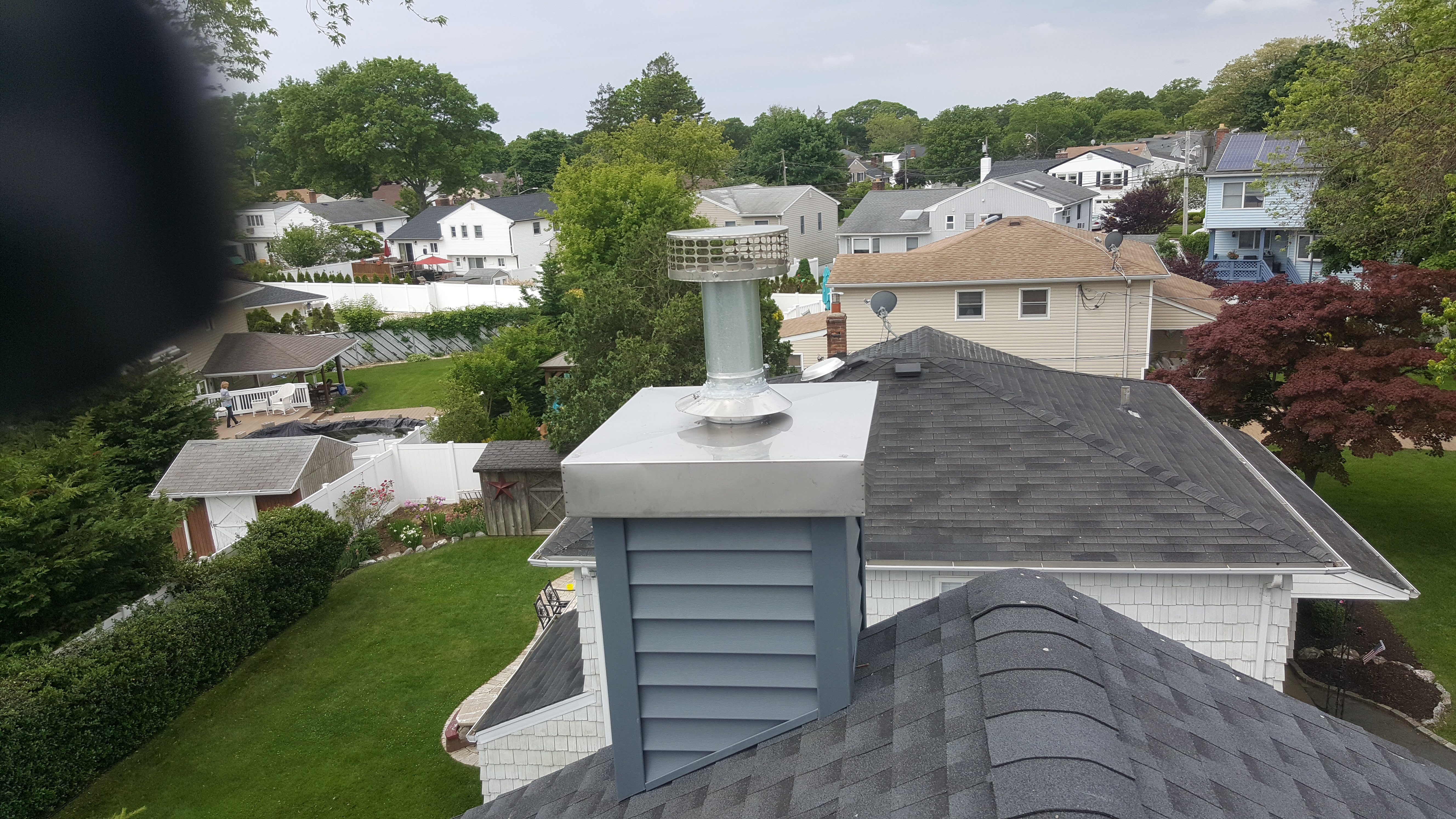 Complete chimney crown rebuild and waterproofing in Dix Hills, New York