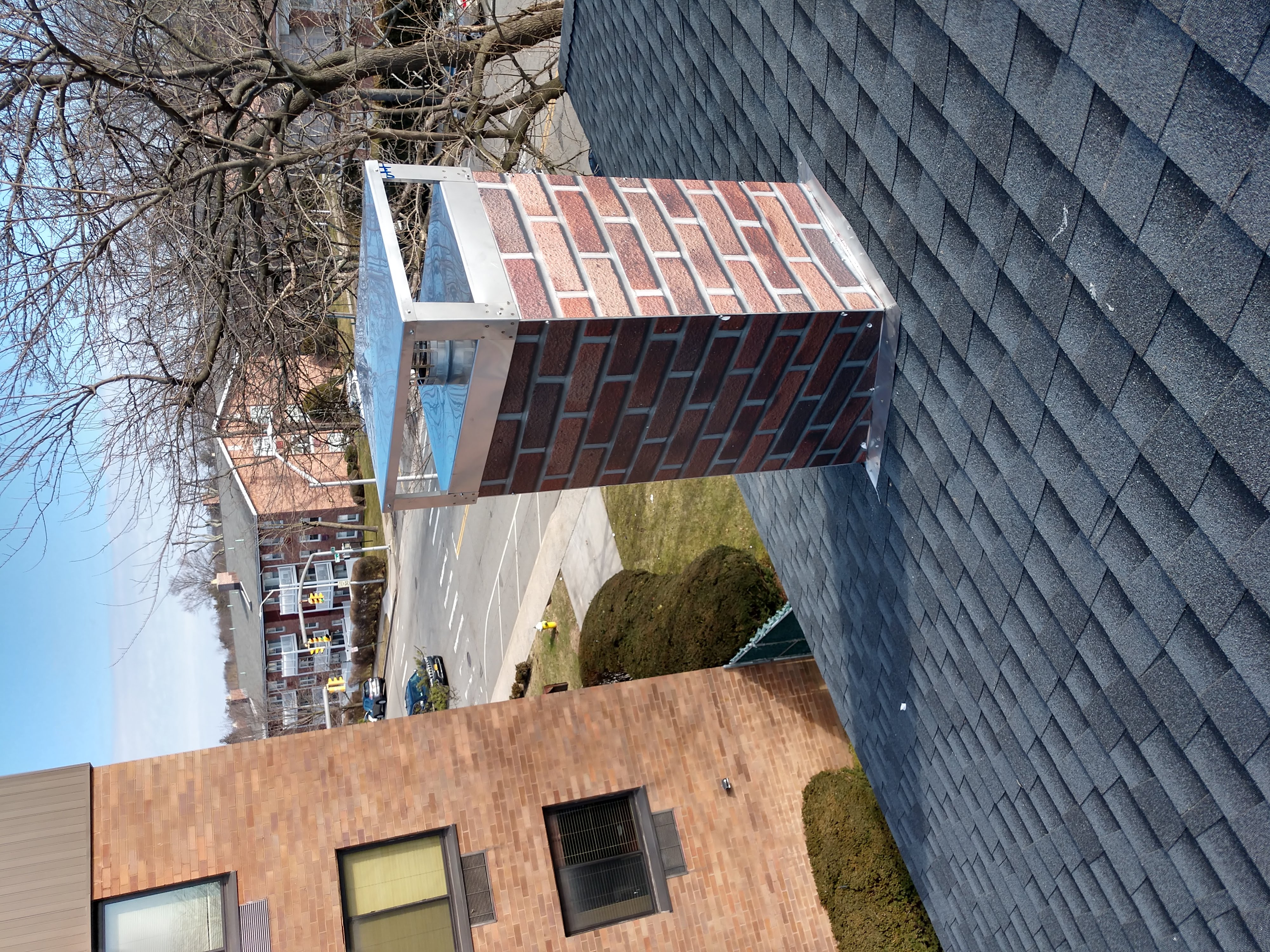 New elastomeric sealant applied to chimney crown in Dix Hills, NY