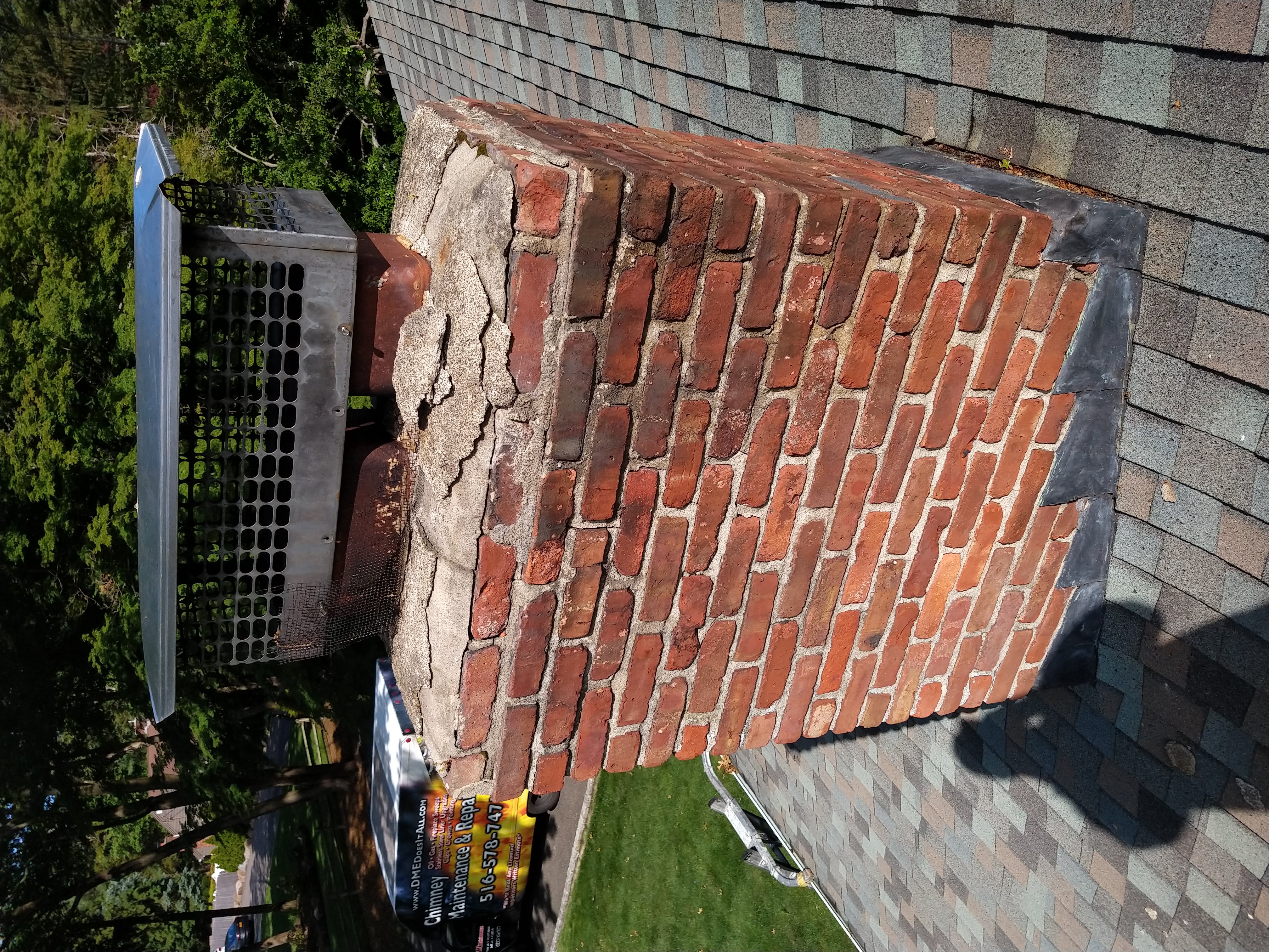 Before and after chimney pointing and tuckpointing in Dix Hills, NY