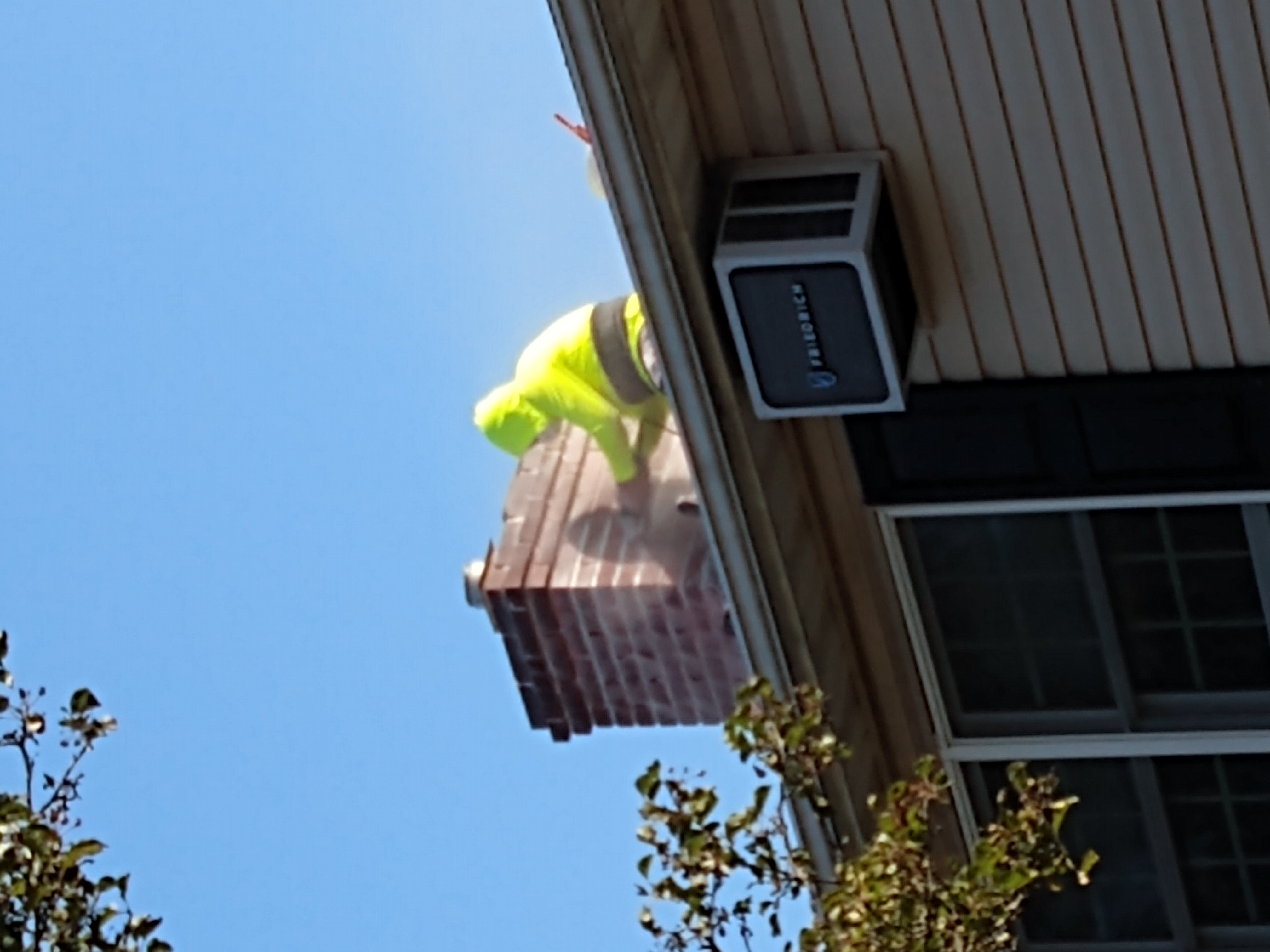 Chimney tuckpointing and mortar repair in Dix Hills, New York