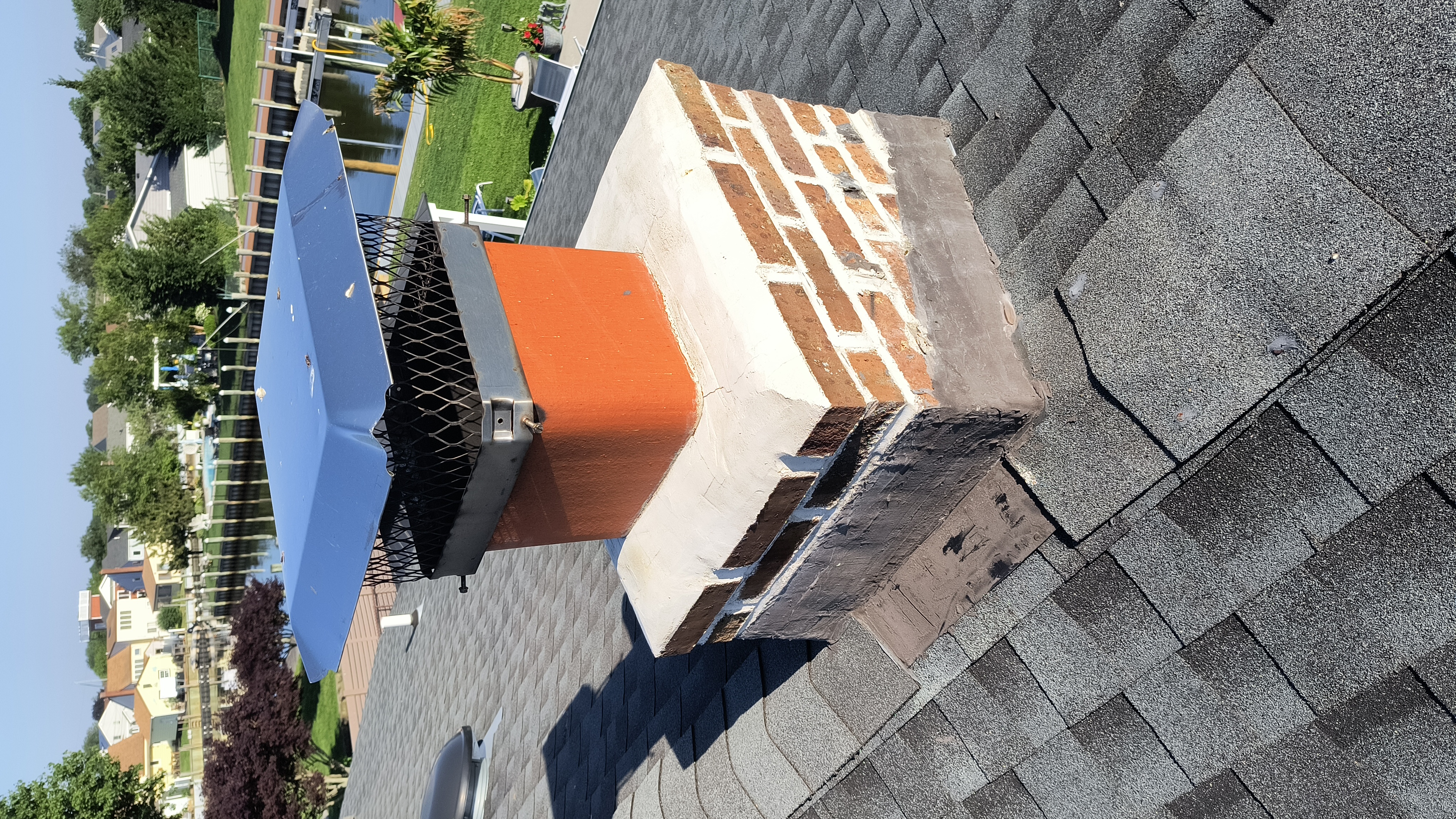 Full chimney masonry rebuild and restoration in Dix Hills, NY