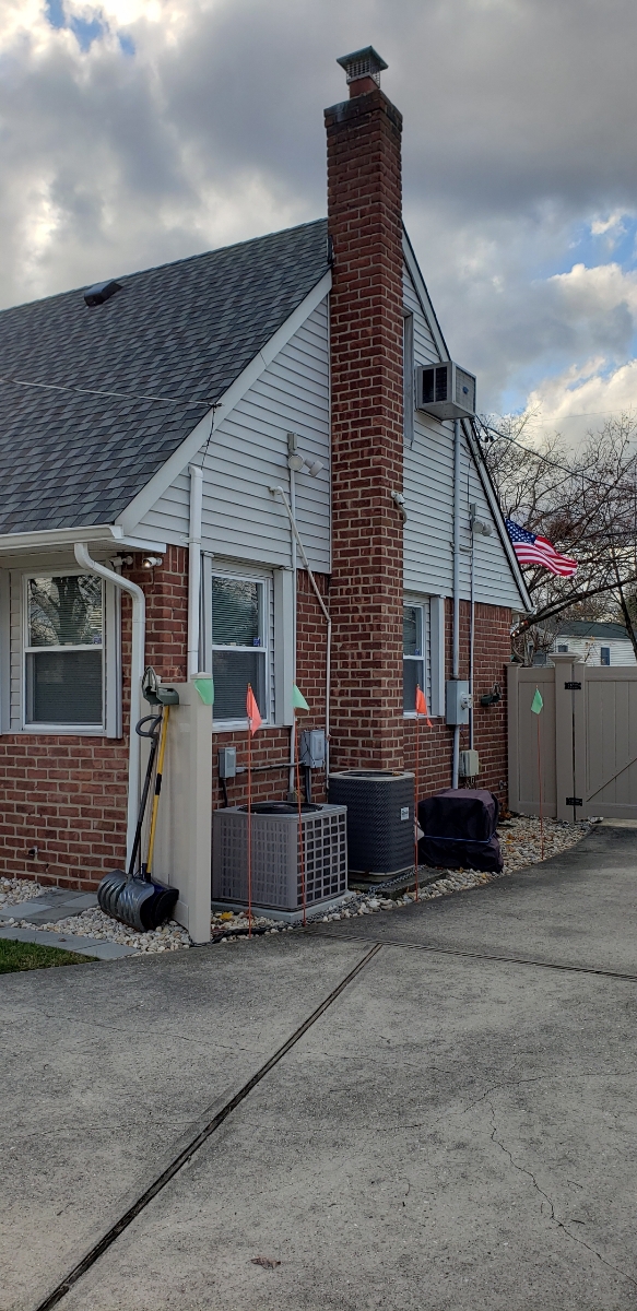 Professional chimney repointing restoring brick joints in Dix Hills, NY